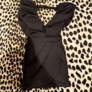 I’m wearing a size small black dress